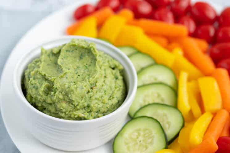green goddess hummus with veggie tray for dipping