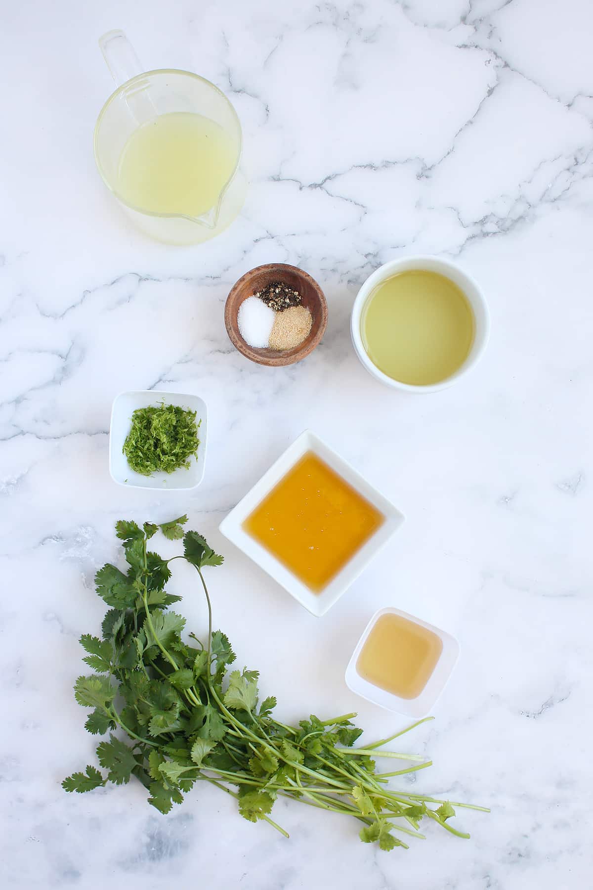 Ingredients needed to make cilantro lime dressing. 