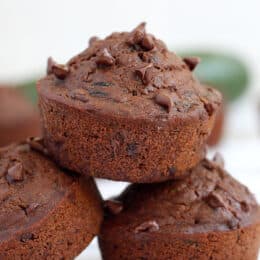 Chocolate zucchini muffins stacked